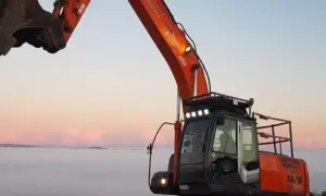 Hitachi 210 LC up above the clouds at windfarms