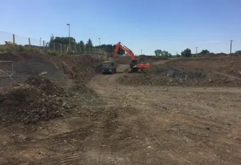 Hitachi 350 LC 6 loading stone into truck JPG