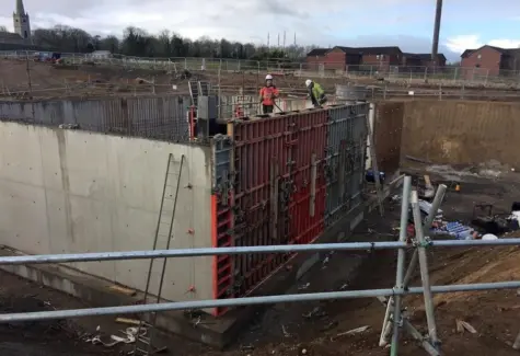 Reinforced concrete walls being constructed jpeg