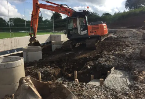 Carefully backfilling around pipework JPG