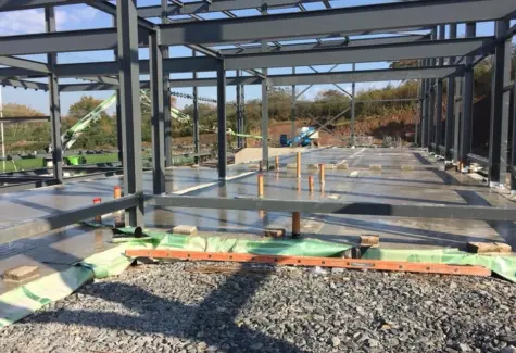 Floors poured and structural steel in place jpeg