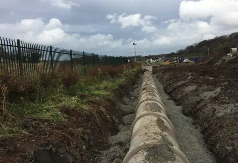 Stoning around pipes JPG