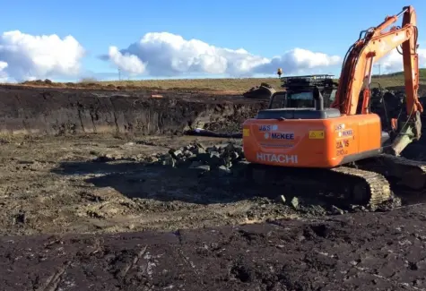 Excavating for turbine bases jpeg