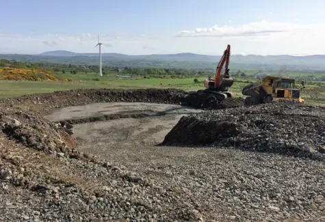 Excavator and ADT forming turbine base JPG