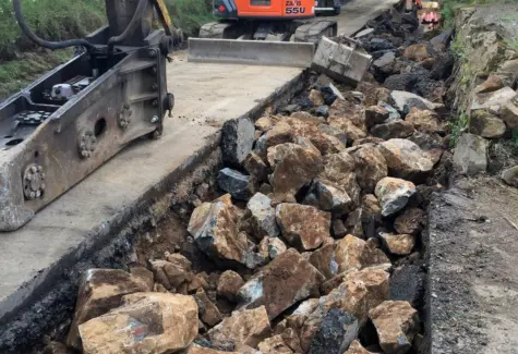 Breaking roadway for cable laying JPG