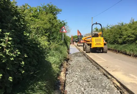 Stoning trenches after electricity cables have been laid JPG